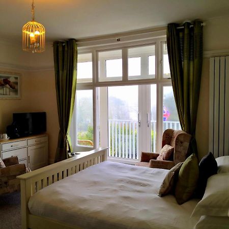 Sunset Guest House 亨斯坦顿 外观 照片 A bedroom at the hotel