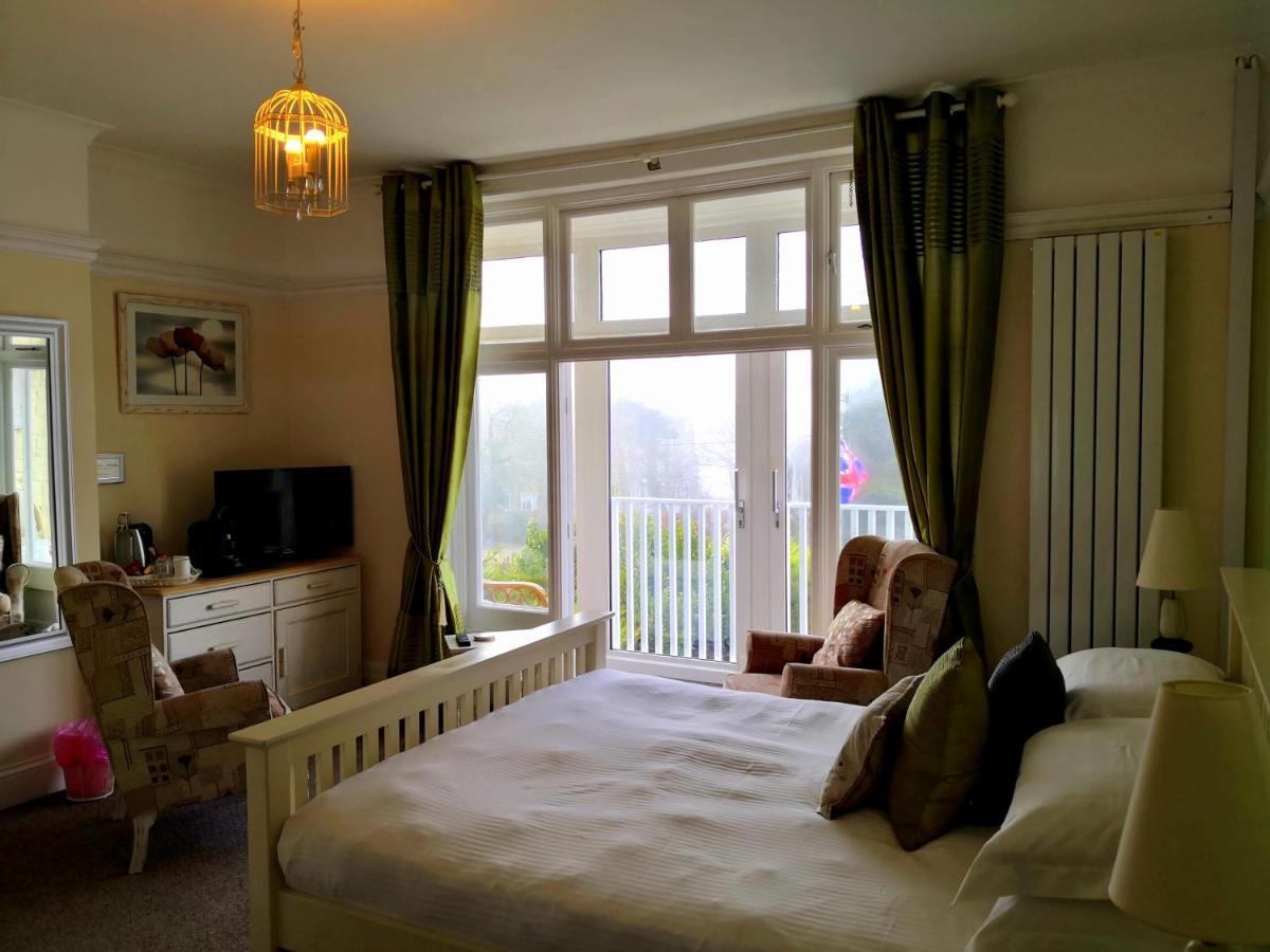 Sunset Guest House 亨斯坦顿 外观 照片 A bedroom at the hotel