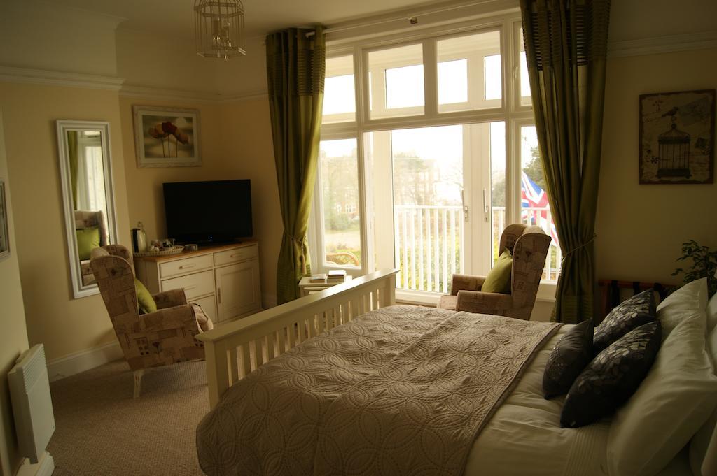 Sunset Guest House 亨斯坦顿 客房 照片 A bedroom at the hotel