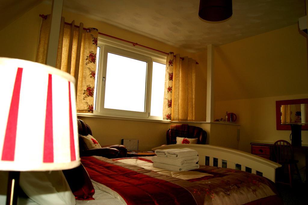 Sunset Guest House 亨斯坦顿 外观 照片 A bedroom