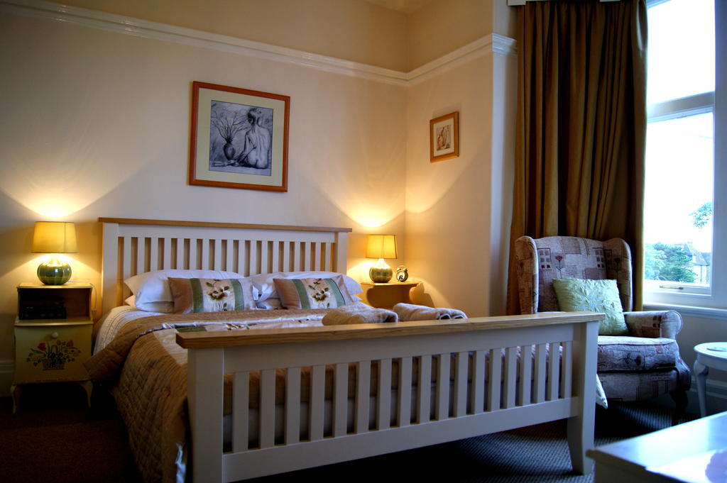Sunset Guest House 亨斯坦顿 客房 照片 A bedroom at the hotel