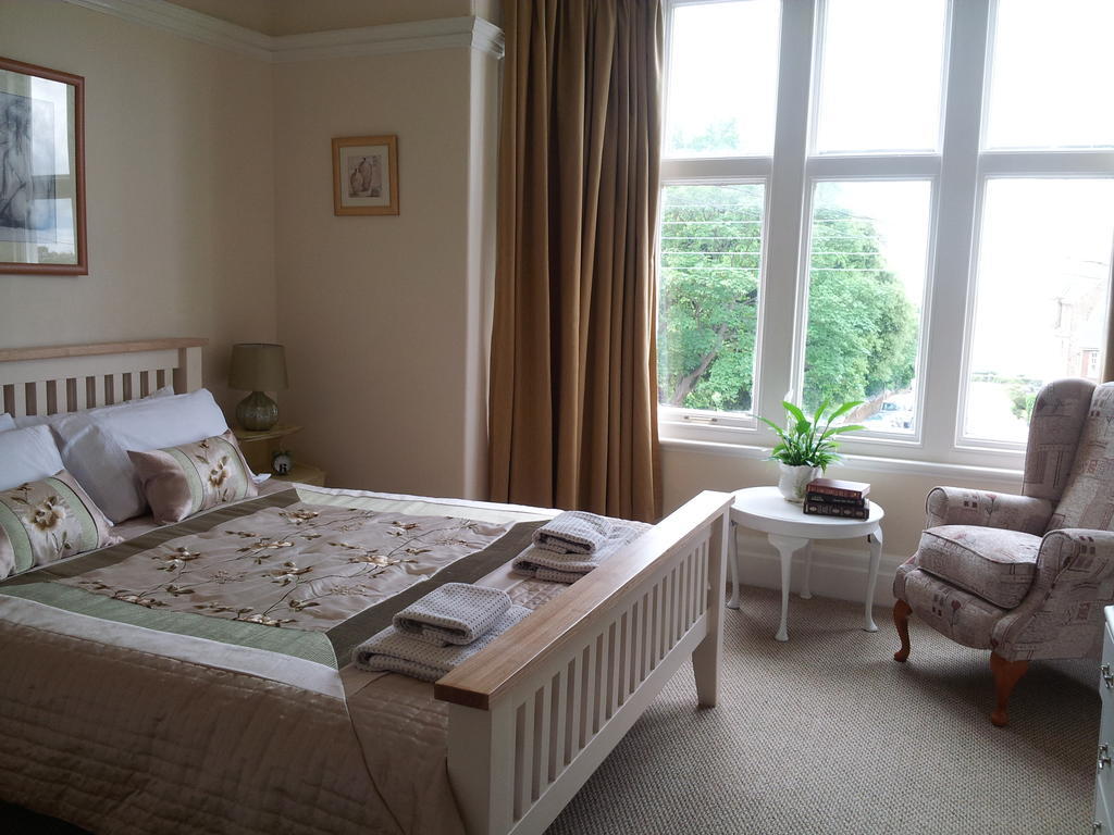 Sunset Guest House 亨斯坦顿 外观 照片 A bedroom at the hotel