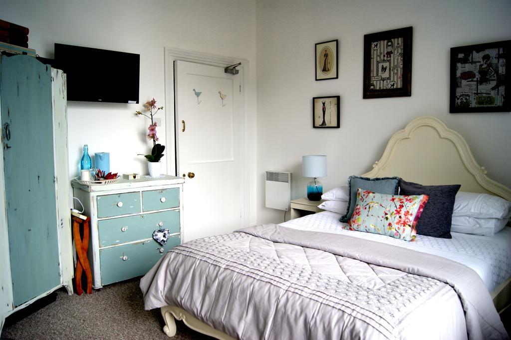 Sunset Guest House 亨斯坦顿 外观 照片 A bedroom